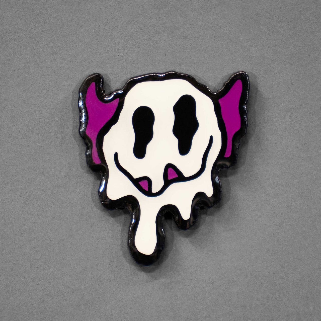 Melty Monster Smiley Face | Glow-in-the-dark Enamel Pin