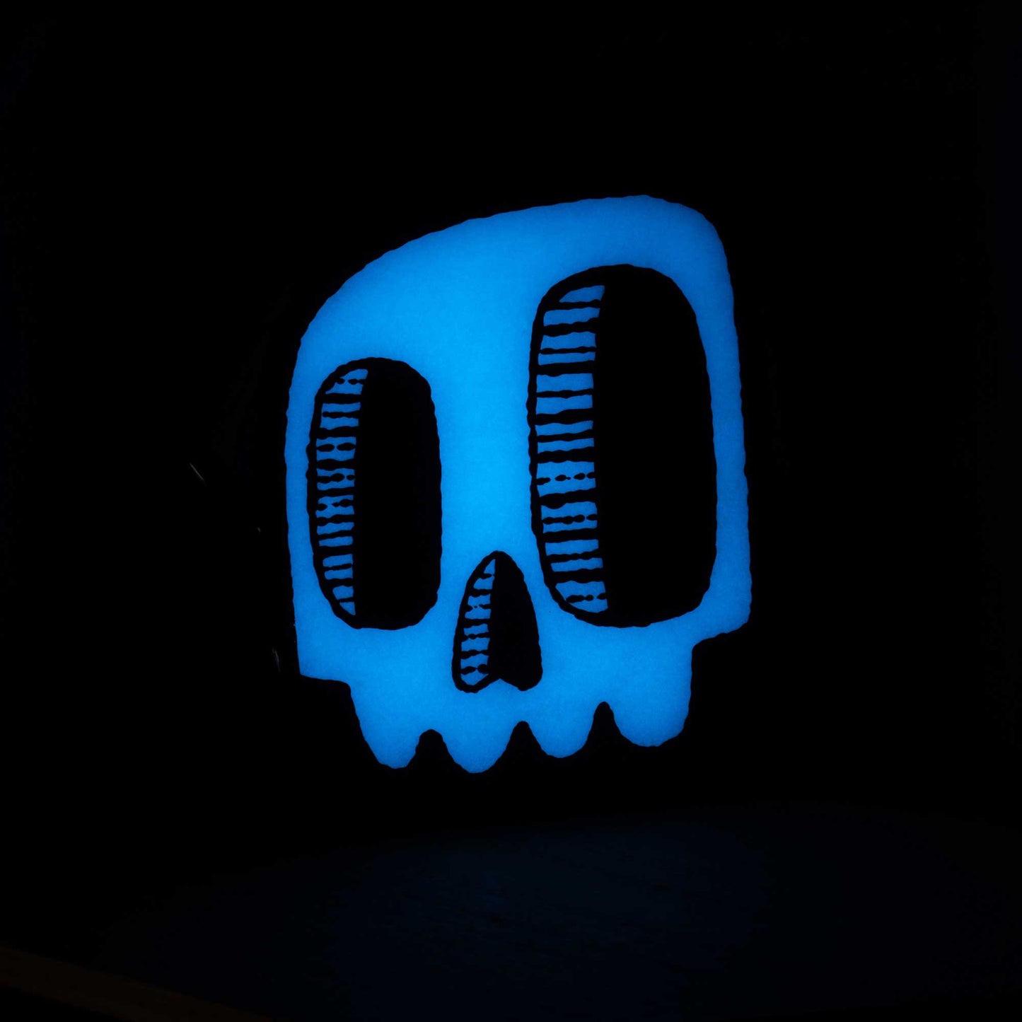 Monster Skull | Soft Blue Glow-in-the-Dark Woodcut Wall Art