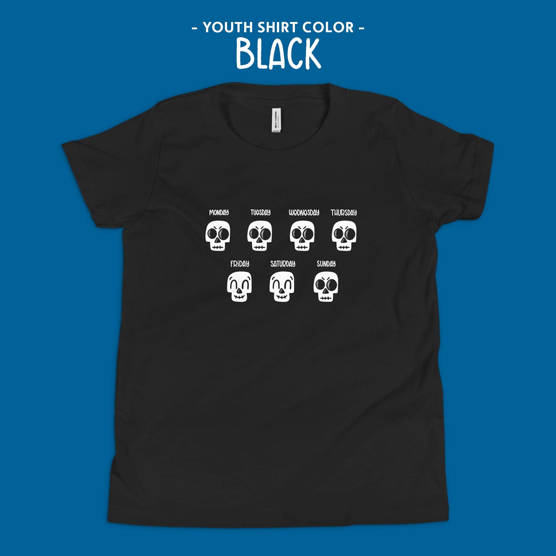 folded black youth shirt with design 