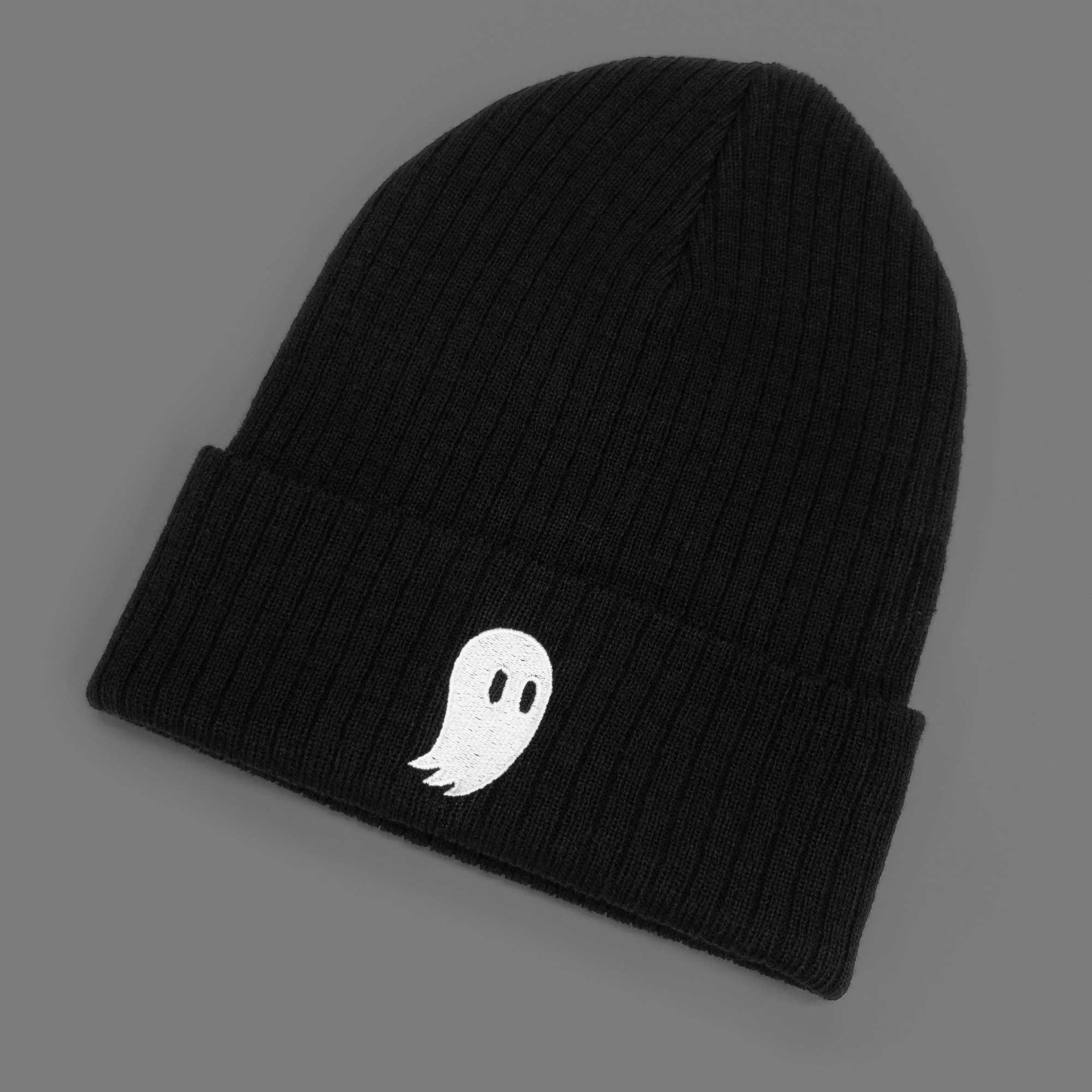 a white ghost embroidered on soft black beanie