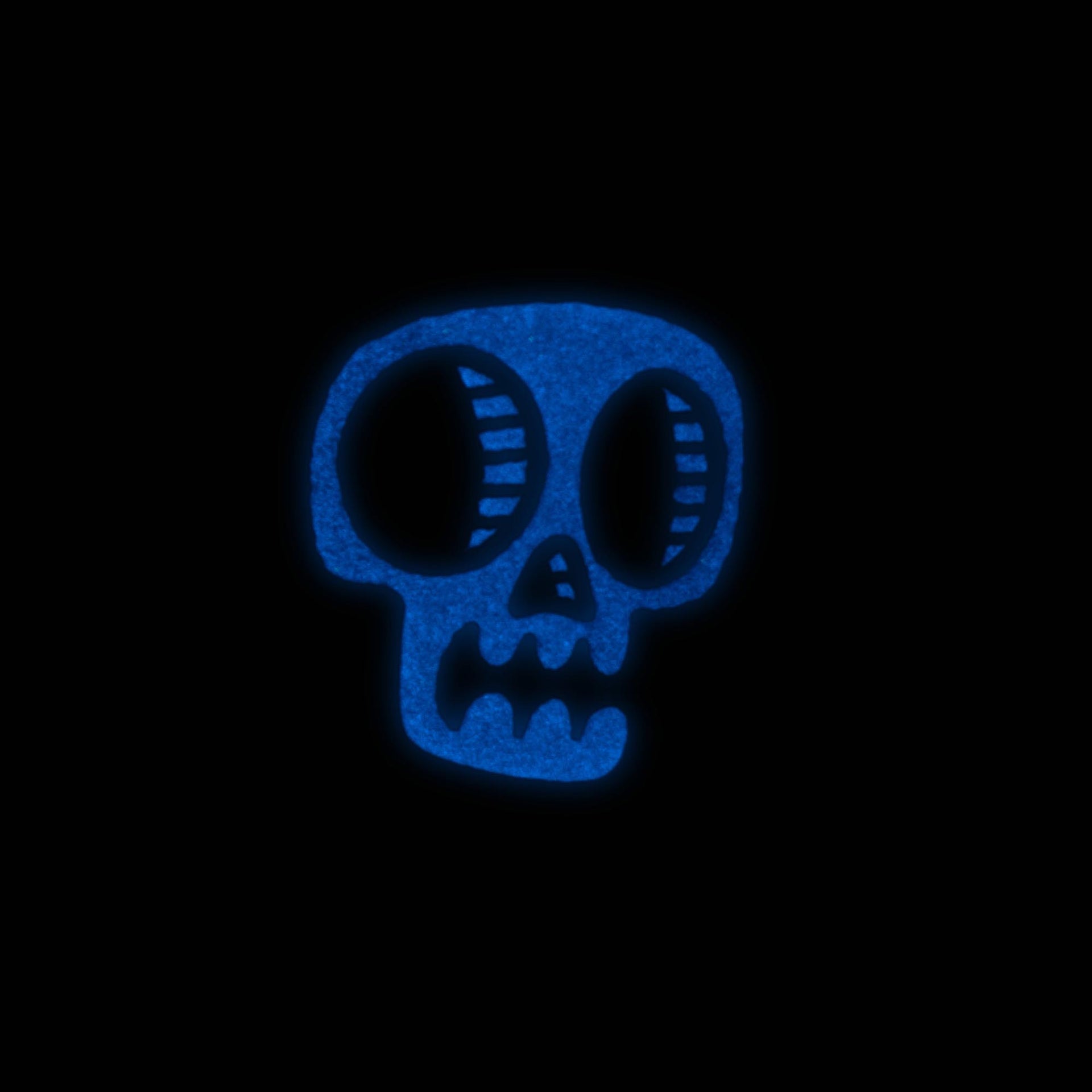 glowing skull enamel pin